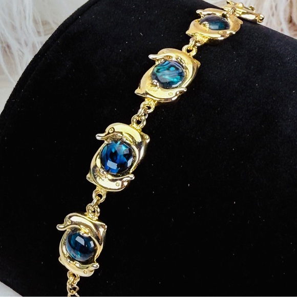Jewelry - Pretty goldtone, dolphin, dancing costume bracelet